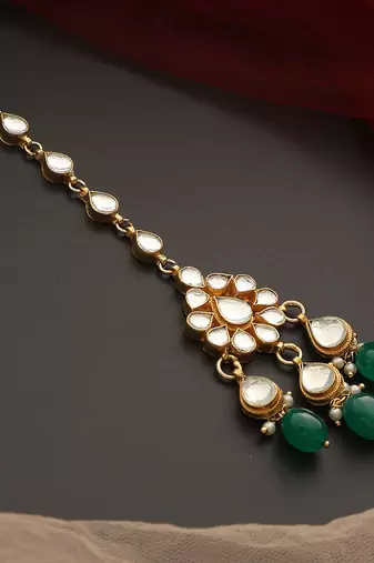 Green gold tone kundan maang tikka