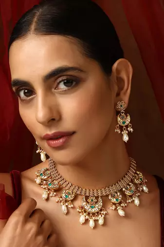 Green gold tone kundan necklace set