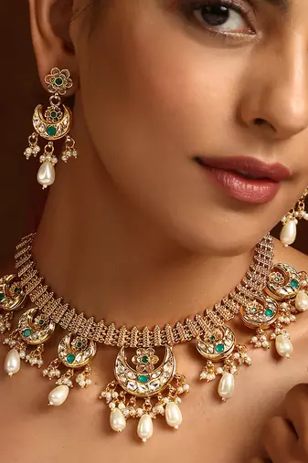 Green gold tone kundan necklace set