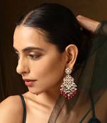 Red gold tone polki dangler earrings