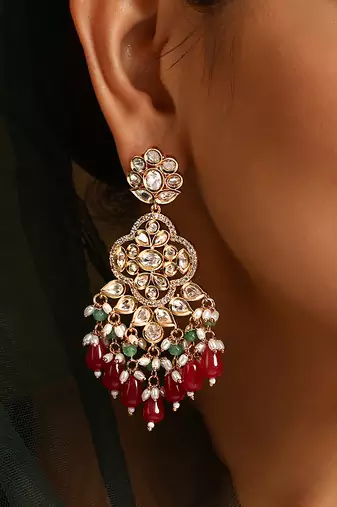 Red gold tone polki dangler earrings