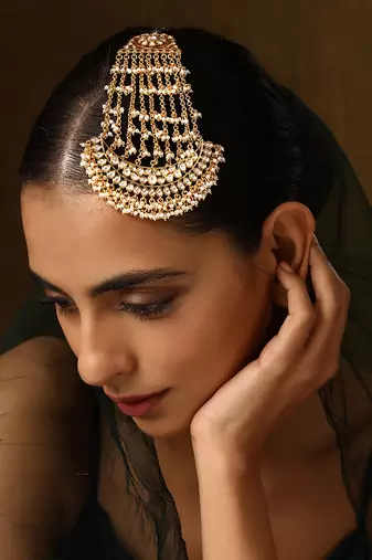 Gold tone polki passa
