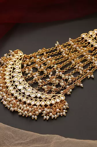 Gold tone polki passa