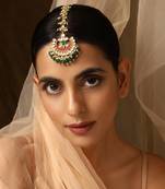 Pink and green gold tone kundan maang tikka