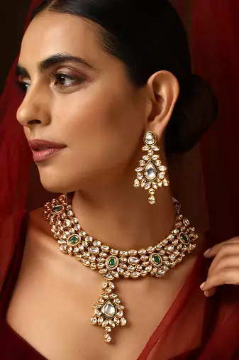 Green gold tone kundan necklace set