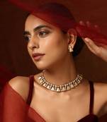 Gold tone kundan temple necklace set