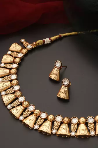 Gold tone kundan temple necklace set