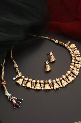 Gold tone kundan temple necklace set