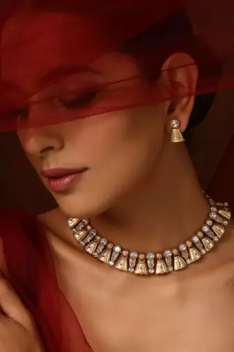 Gold tone kundan temple necklace set