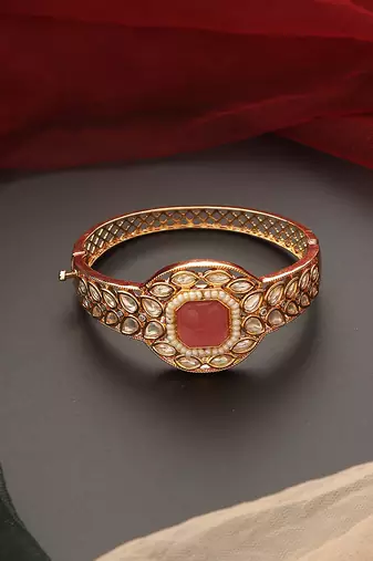 Pink gold tone kundan bracelet