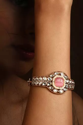 Pink gold tone kundan bracelet