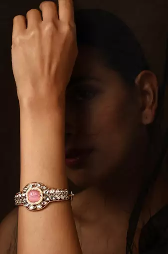 Pink gold tone kundan bracelet