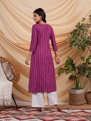 A line woven kurta with a shoulder princess line with a central placket. 2