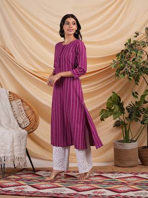 A line woven kurta with a shoulder princess line with a central placket. 3