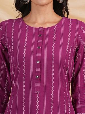 A line woven kurta with a shoulder princess line with a central placket. 5