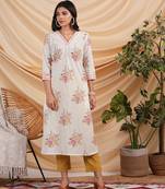 A-line floral printed cotton kurta with v neck and pocket detail.