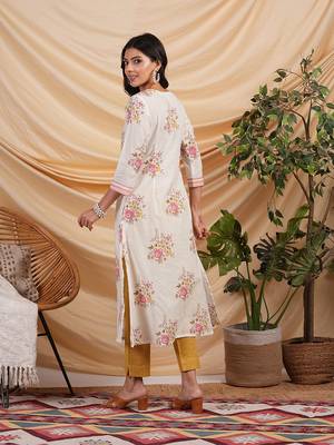 A-line floral printed cotton kurta with v neck and pocket detail. 2