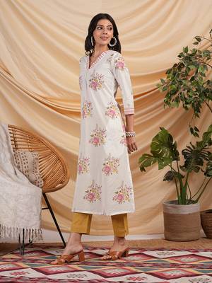 A-line floral printed cotton kurta with v neck and pocket detail. 3