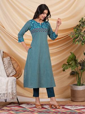 A line striped kurta with printed cotton trim,block print and hand embroidery. 4