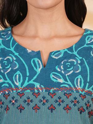 A line striped kurta with printed cotton trim,block print and hand embroidery. 5