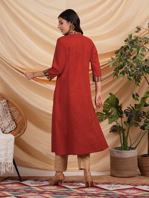 A line cotton kurta with hand applique and embroidery detailling. 2