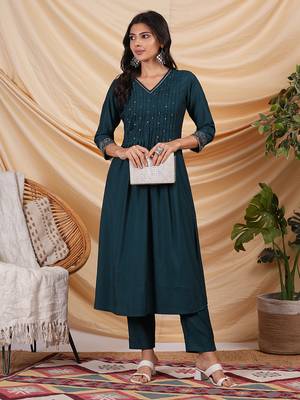 Pleated silk blend kurta with zari embroidery and sequin work. 1