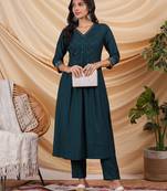 Pleated silk blend kurta with zari embroidery and sequin work.