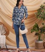 Flared printed cotton v neck top with lace detailing.