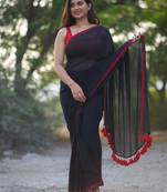 Handloom black cotton saree with tassels and red border without blouse
