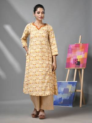 White & mustard yellow cotton kurta with ethnic prints 1