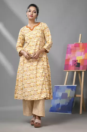 White & mustard yellow cotton kurta with ethnic prints