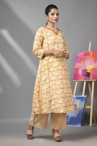 White & mustard yellow cotton kurta with ethnic prints