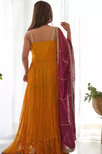Yellow bandhani anarkali kurta with wine dupatta