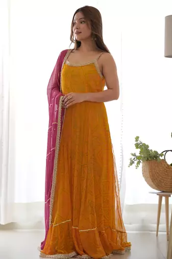 Yellow bandhani anarkali kurta with wine dupatta