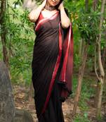 Organic cotton black handloom saree with red border and tassels - without blouse