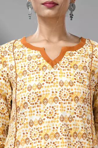 White & mustard yellow cotton kurta with ethnic prints