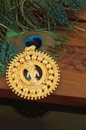 Kerala style gold plated palakka krishna pendant