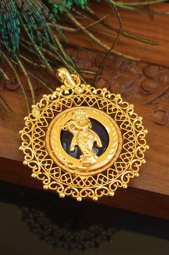 Kerala style gold plated palakka krishna pendant