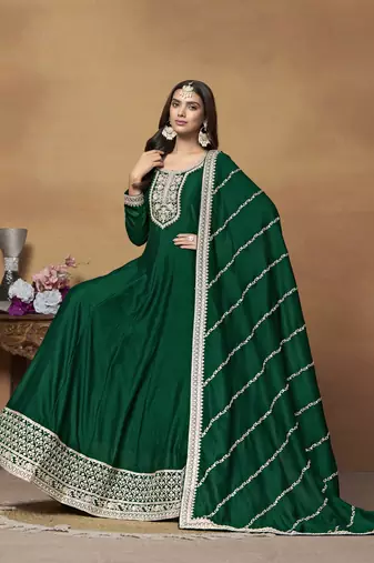 Green colour heavy embroidered rich partywear anarkali suit