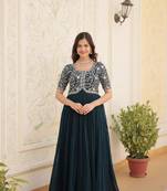 Women's turquoise faux blooming with embroidered zari sequins work luxury gown