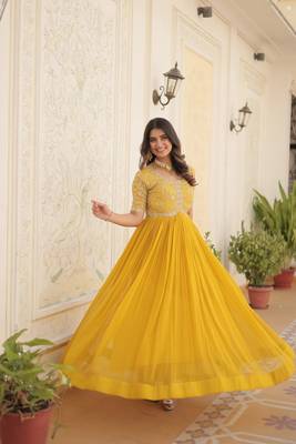Women's yellow faux blooming with embroidered zari sequins work luxury gown 1