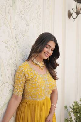 Women's yellow faux blooming with embroidered zari sequins work luxury gown 4