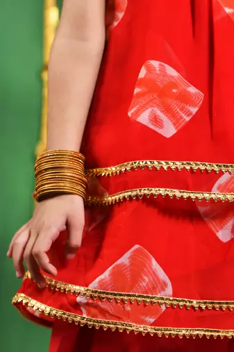 Girl's red kurta and dhoti set