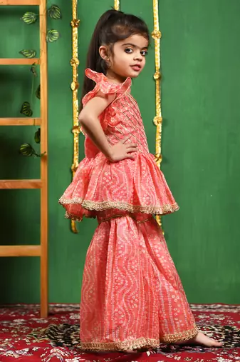Girl's peach leheriya printed kurti with lace work sharara set