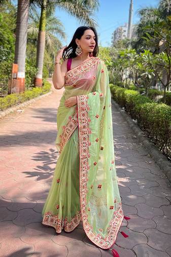 Green twill net designer embroidery work with embellished diamond work saree