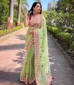 Green twill net designer embroidery work with embellished diamond work saree
