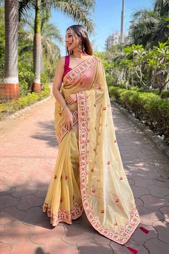 Yellow twill net designer embroidery work with embellished diamond work saree