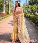 Yellow twill net designer embroidery work with embellished diamond work saree