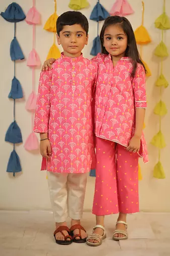 Pink block printed high-low kurta set.