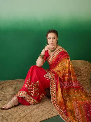 Riva enterprise women's soft mose chiffon with bhandhani print with heavy lace saree with blouse 1